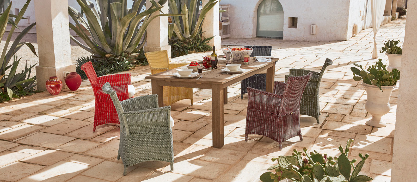 Capri outdoor armchairs in coloured fibre