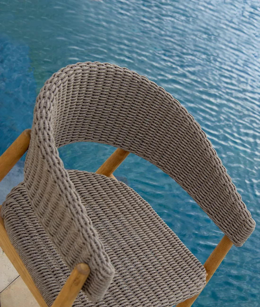 Small armchair in teak and cord Pevero
