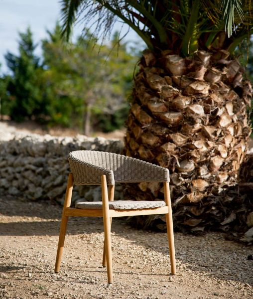 Small armchair in teak and cord Pevero